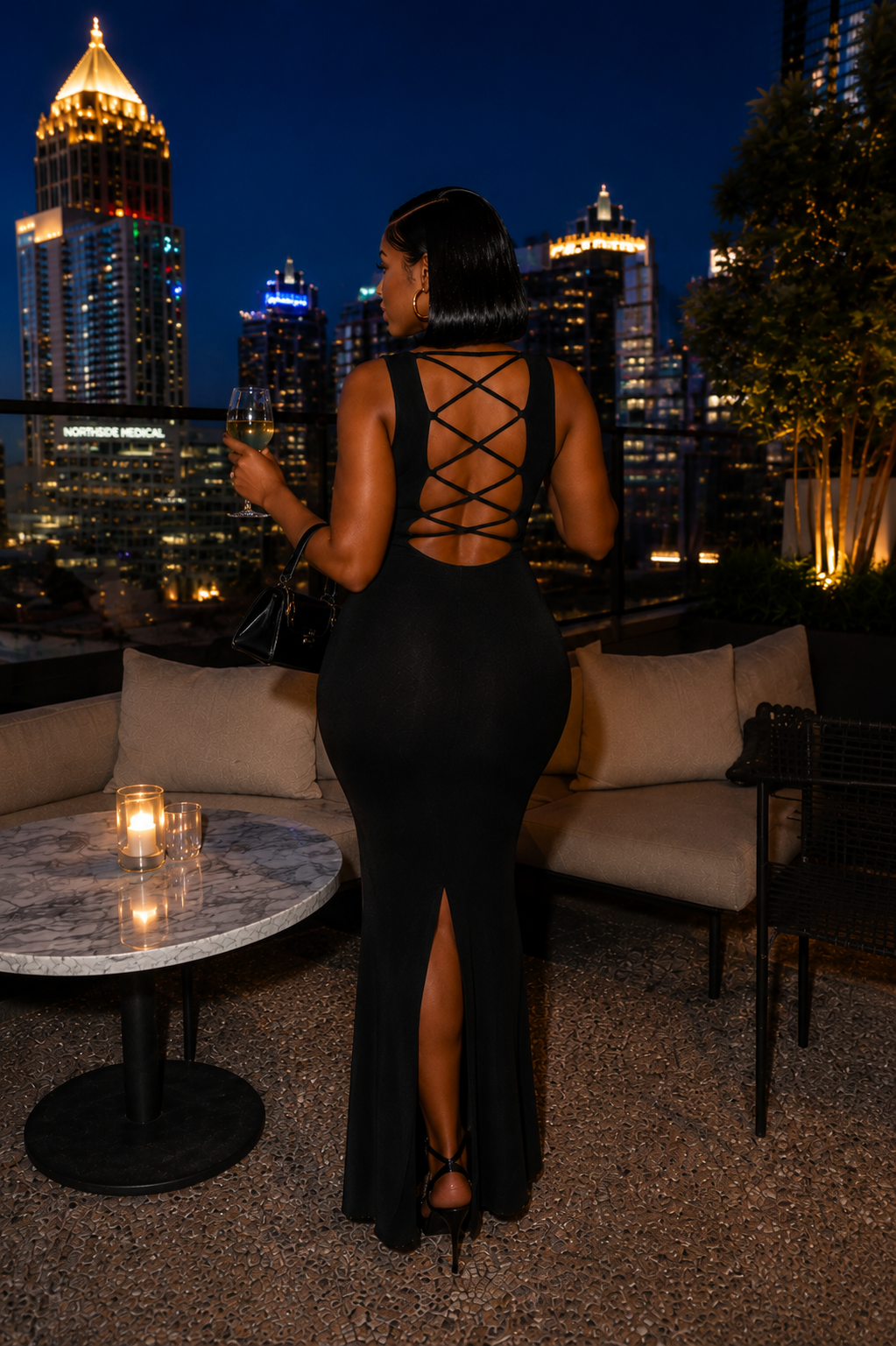 The Kept Woman — backless gown, Atlanta skyline